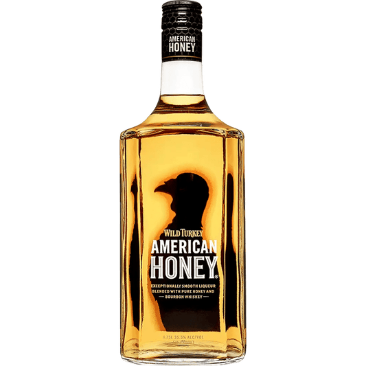 A bottle of Wild Turkey American Honey bourbon whiskey with a label depicting a silhouette of a turkey.