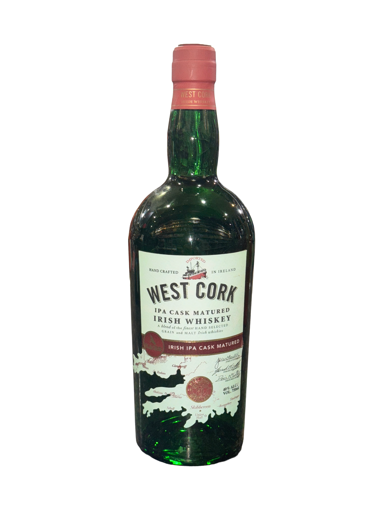 Green bottle of West Cork Irish Whiskey on a white background