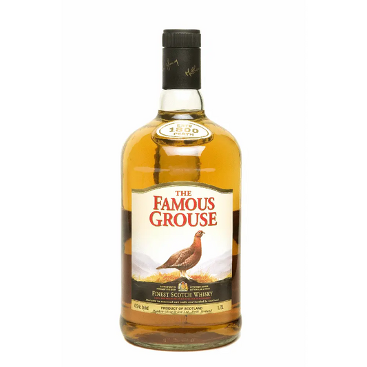 Bottle of The Famous Grouse whisky on a white background