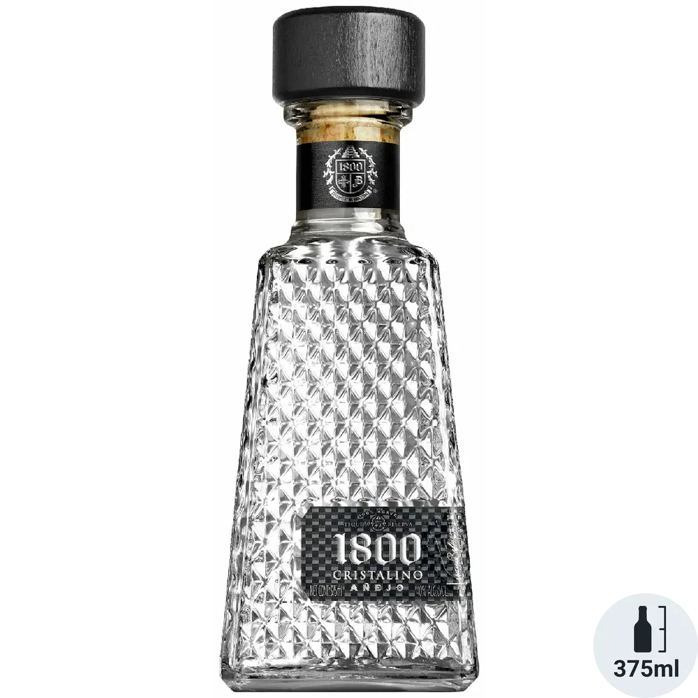 Clear glass bottle with diamond pattern and black cap on a white background