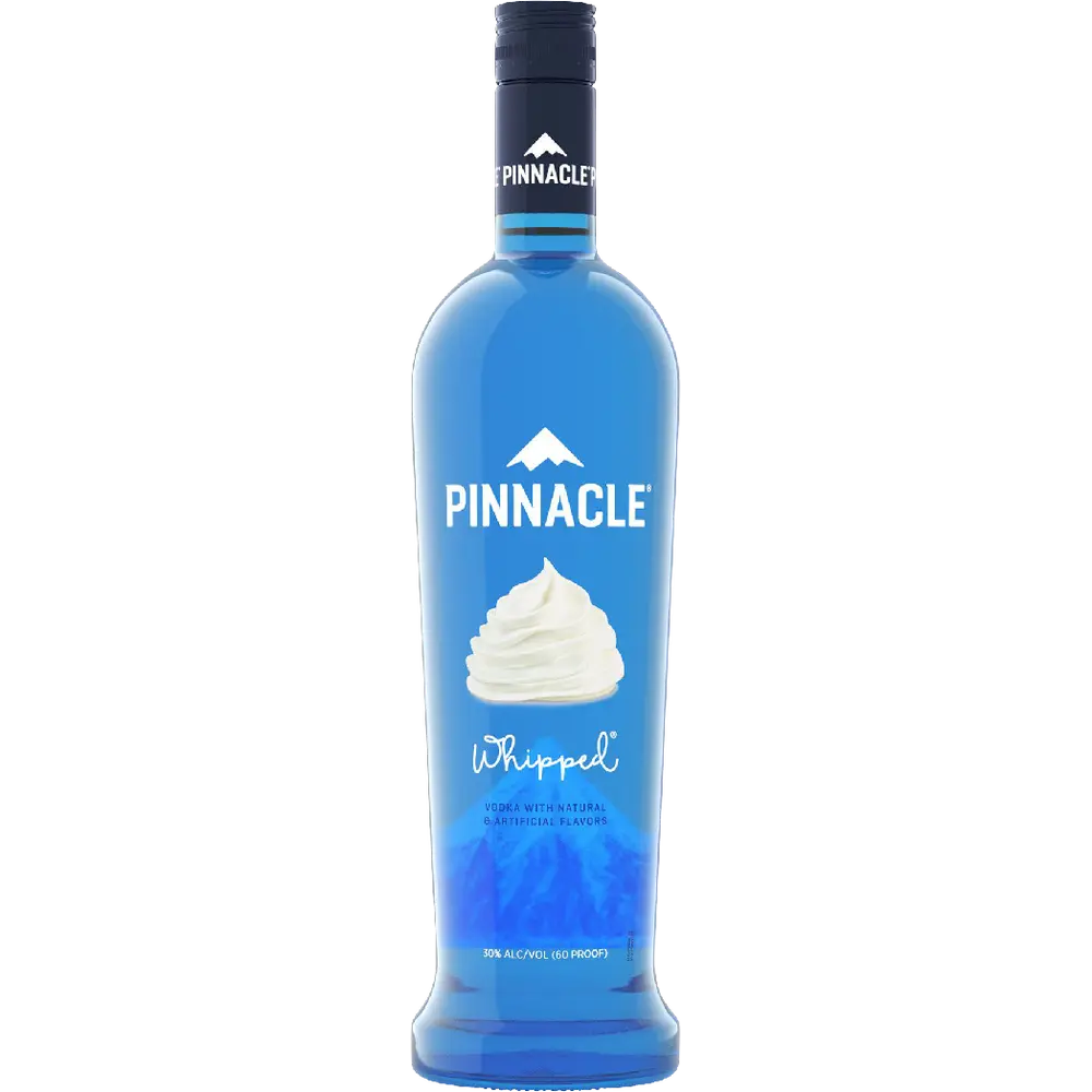 A bottle of Pinnacle Whipped rum spirit distillate, featuring a vibrant blue bottle with a white whipped cream graphic on the label and a black cap, set against a plain white background.