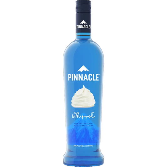 A bottle of Pinnacle Whipped rum spirit distillate, featuring a vibrant blue bottle with a white whipped cream graphic on the label and a black cap, set against a plain white background.