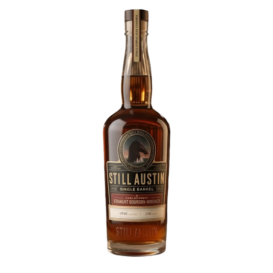A bottle of Still Austin Single Barrel Straight Bourbon Whiskey against a solid black background. The amber liquid inside the clear glass bottle is visible, along with a gold neck seal and a black label featuring a horse logo and gold lettering.