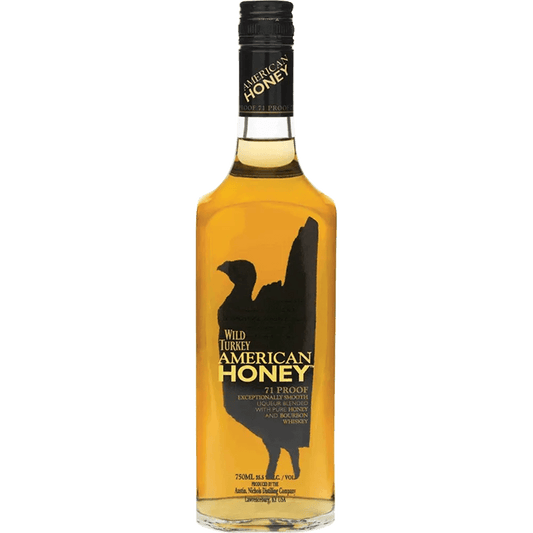 A bottle of Wild Turkey American Honey bourbon whiskey with a label depicting a silhouette of a turkey.
