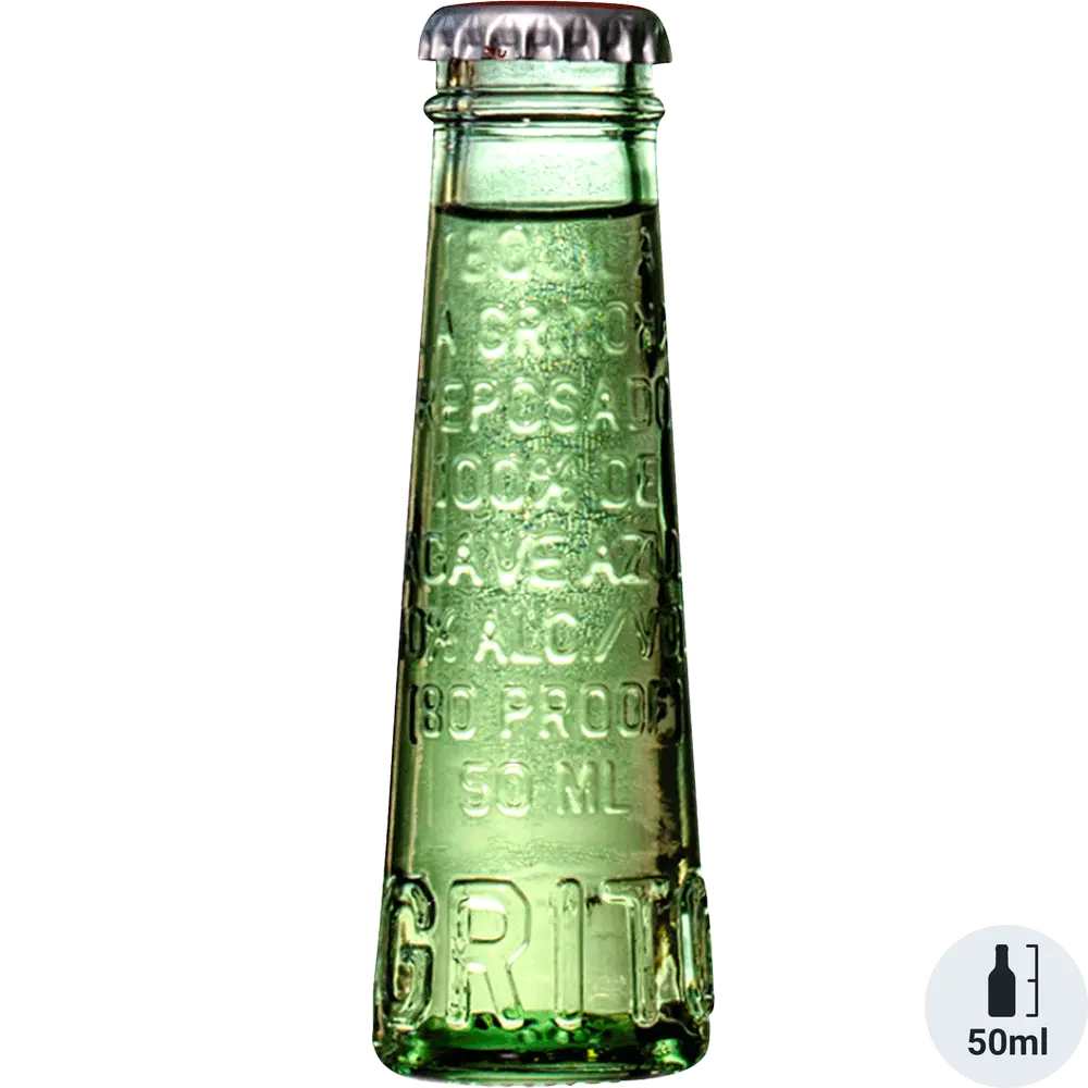 Green glass bottle with embossed text on a white background
