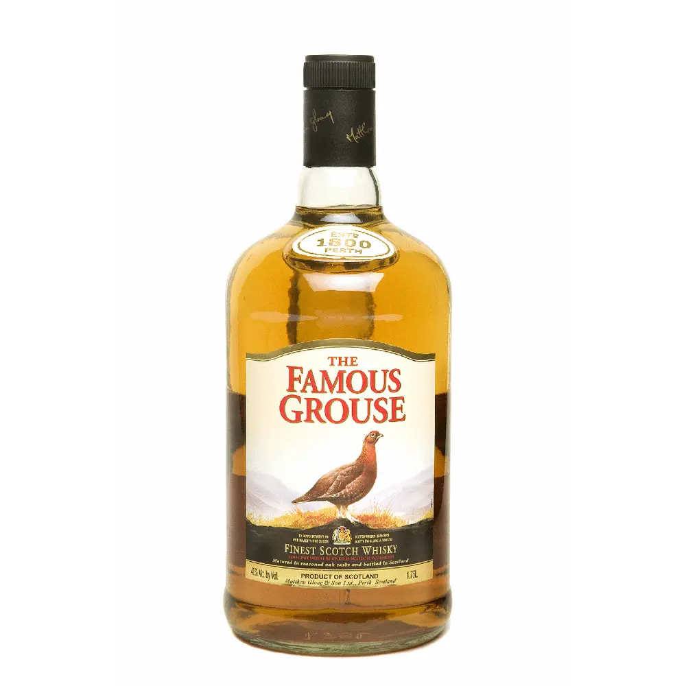 Bottle of The Famous Grouse whisky on a white background