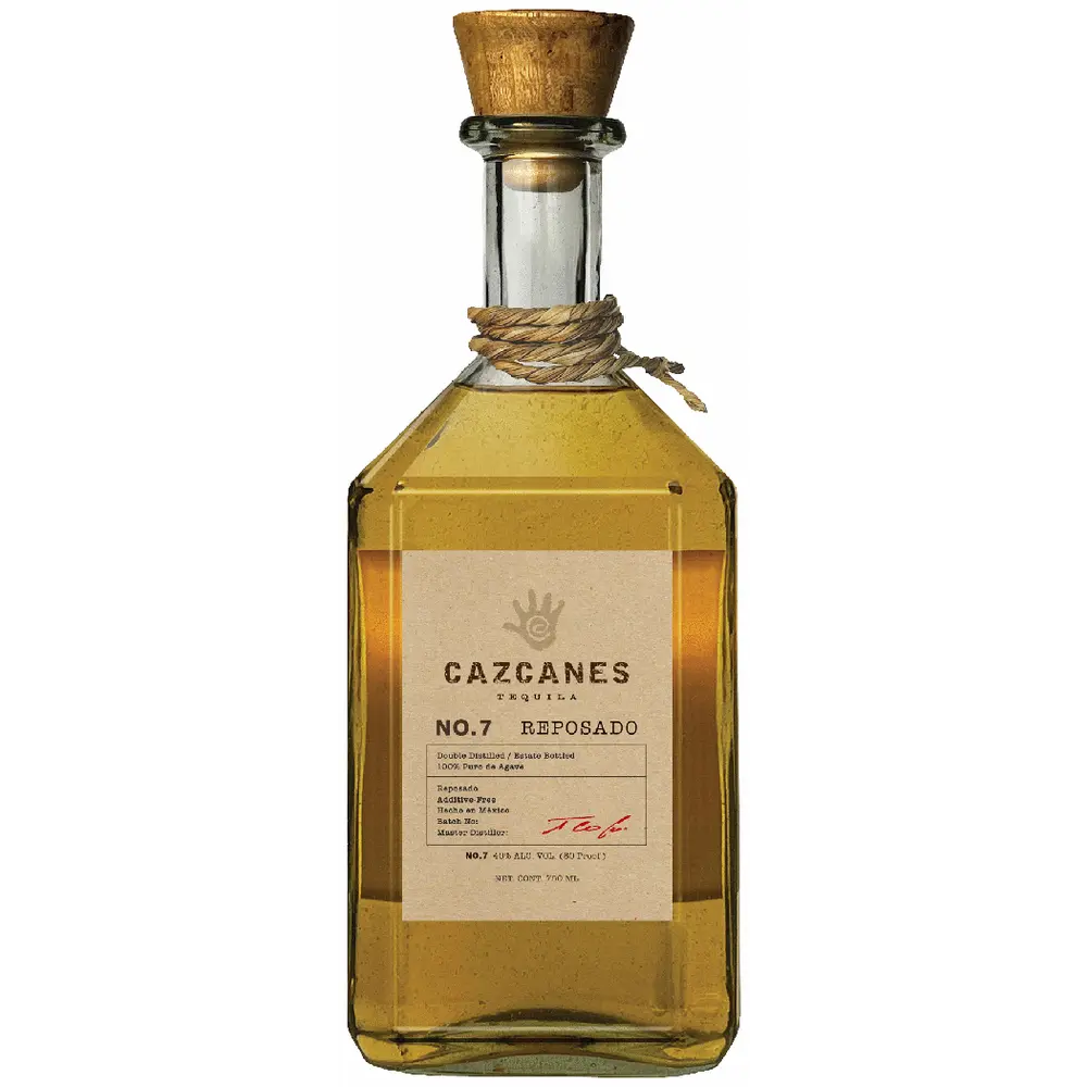 Cazcanes Reposado tequila bottle with wooden cap on a white background