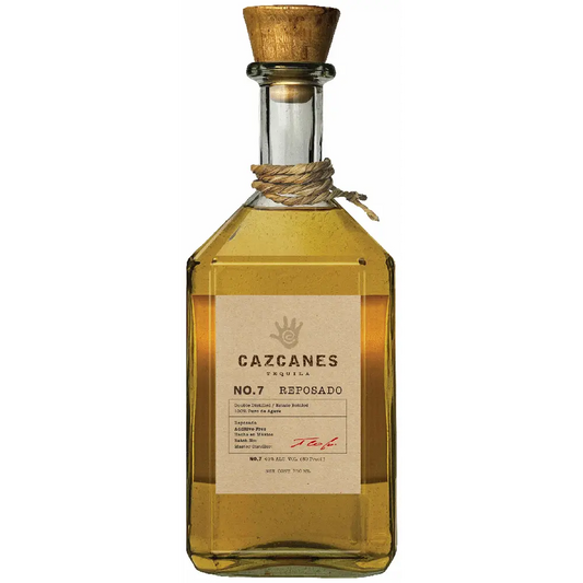 Cazcanes Reposado tequila bottle with wooden cap on a white background