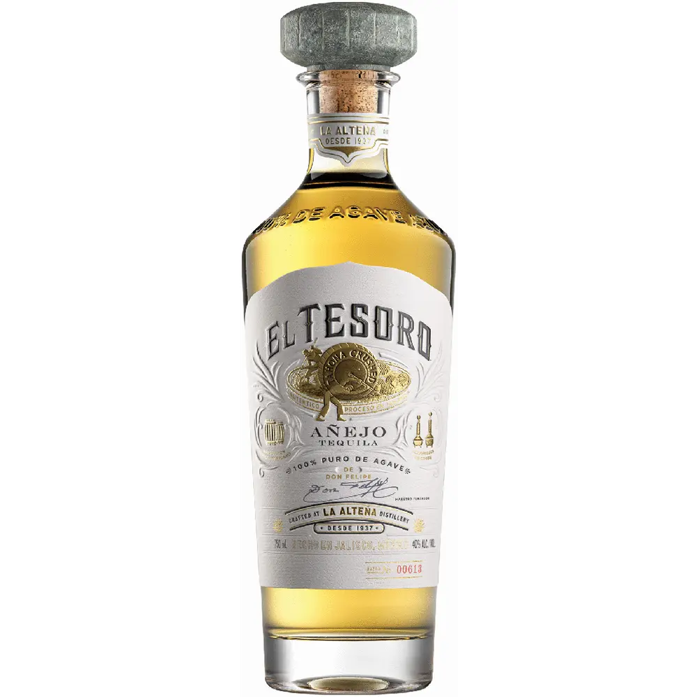 Bottle of El Tesoro tequila on a white background