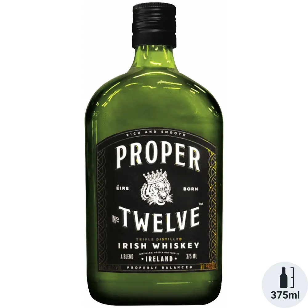 Green bottle of Proper No. Twelve Irish Whiskey on a white background