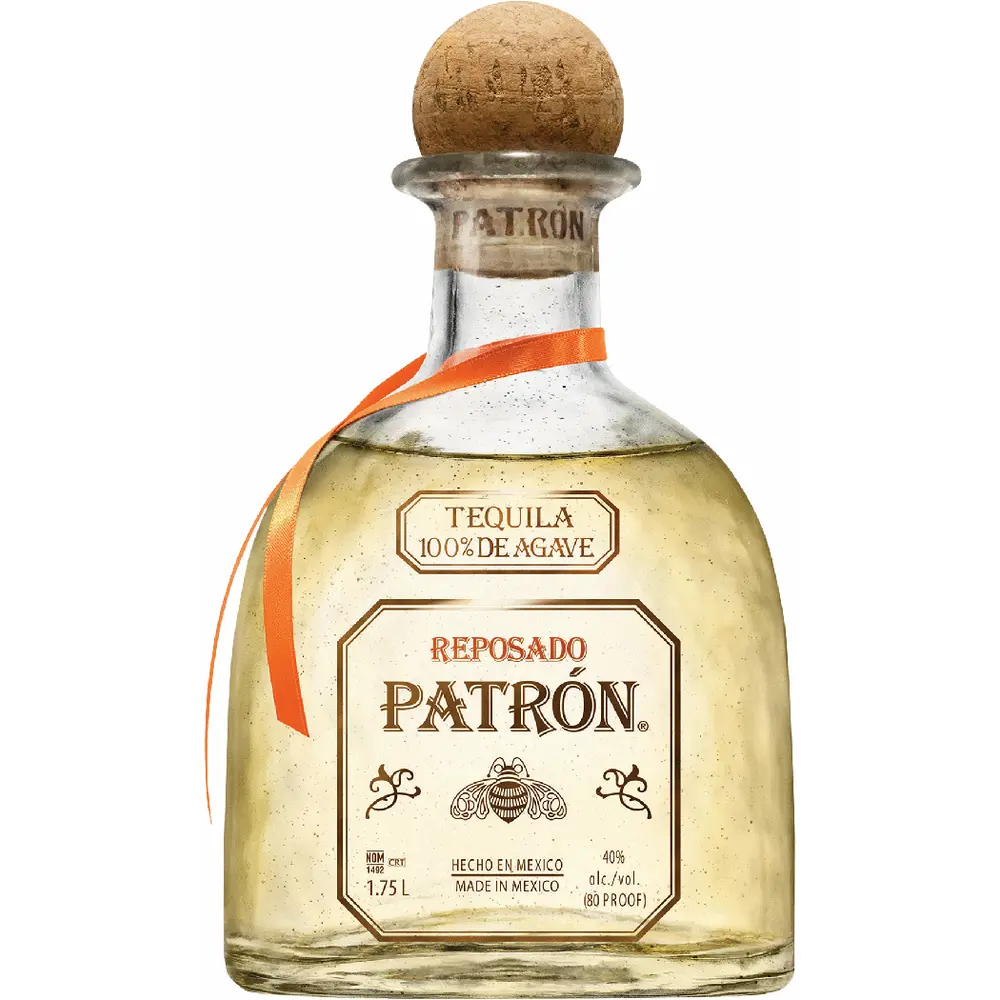 Patron Reposado tequila bottle with cork stopper on a white background