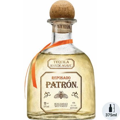 Patrón Reposado tequila bottle with cork stopper on a white background