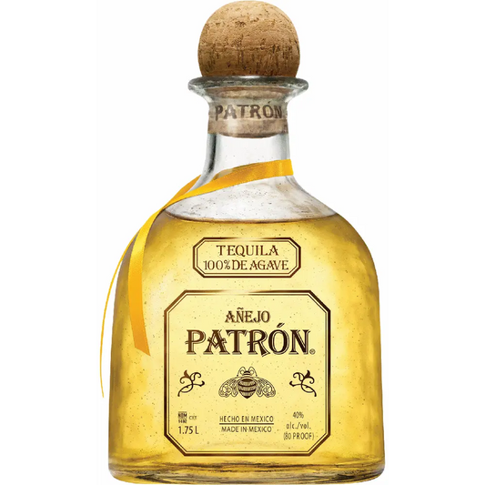 Patrón tequila bottle with cork stopper on a white background
