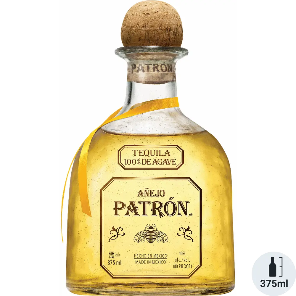 Patrón Aéjo tequila bottle with cork stopper on a white background