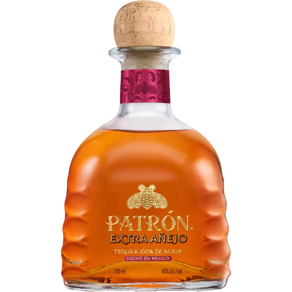 Patrón Extra Añejo tequila bottle with cork stopper on a white background