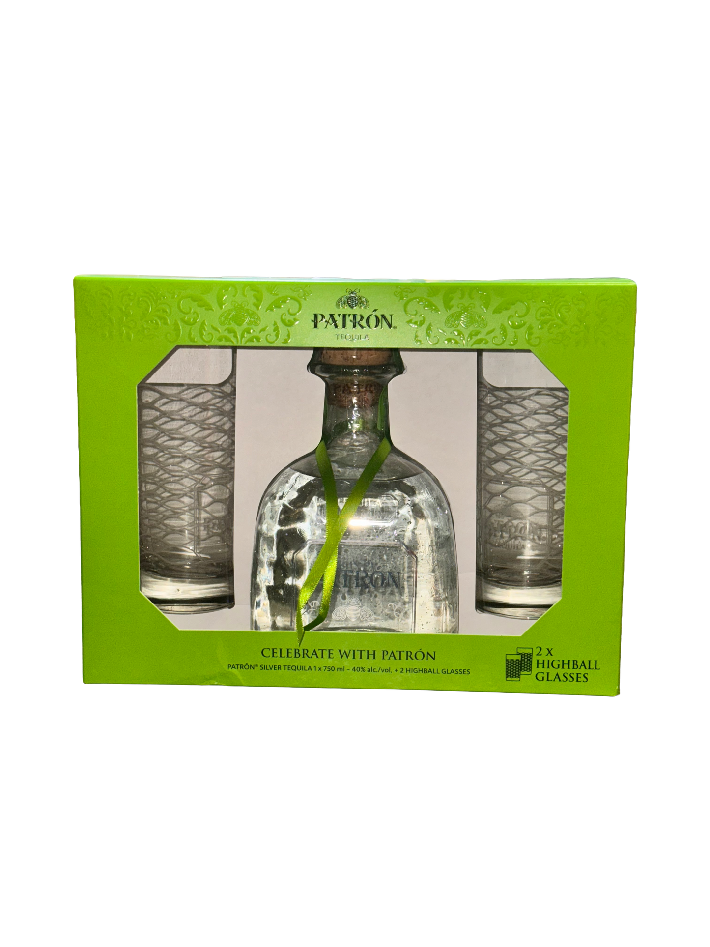 Patron tequila bottle with two glasses in a green box on a white background