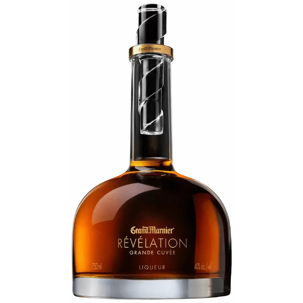 Bottle of Grand Marnier Revelation Grande Cuvee on a white background