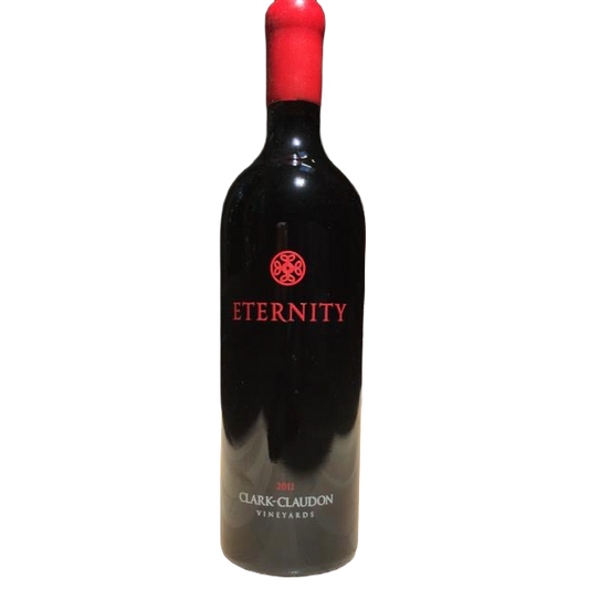 Wine bottle labeled 'Eternity' by Clark Claudon on a white background
