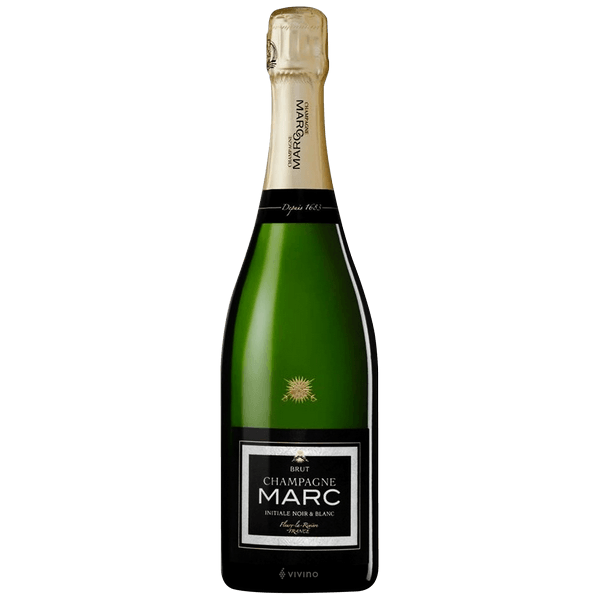 Champagne bottle with green label on a white background