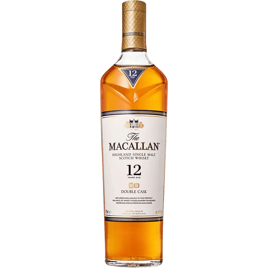 A bottle of The Macallan Scotch Single Malt Double Cask 12 Year with a gold and purple label, displaying the Macallan logo and the number 12 indicating its age.