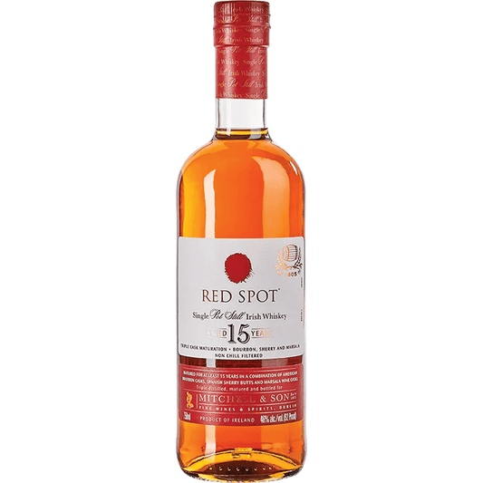 A bottle of Red Spot Single Pot Still Irish Whiskey with a label indicating it is 15 years old, 750ml.