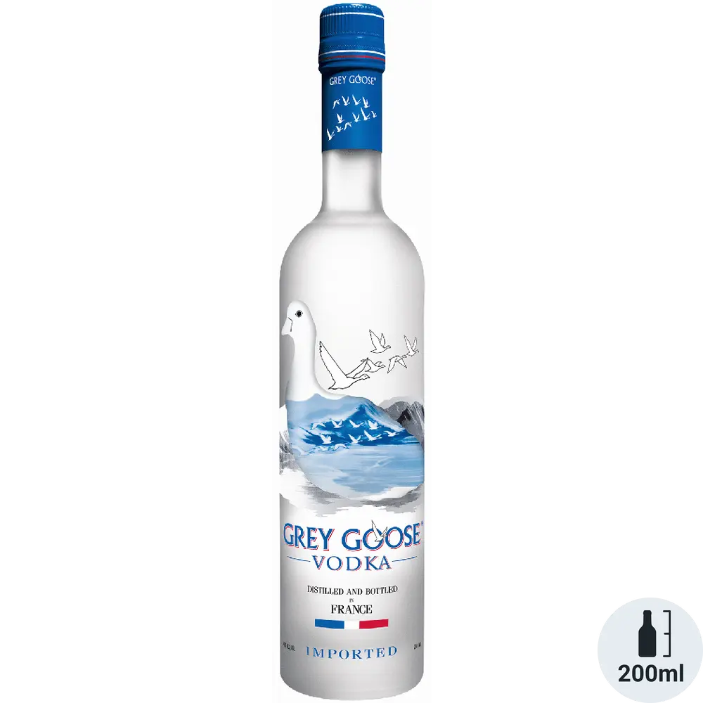 Grey Goose vodka bottle with mountain design on a white background