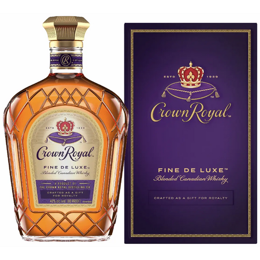Crown Royal Fine De Luxe whiskey bottle and packaging on a white background