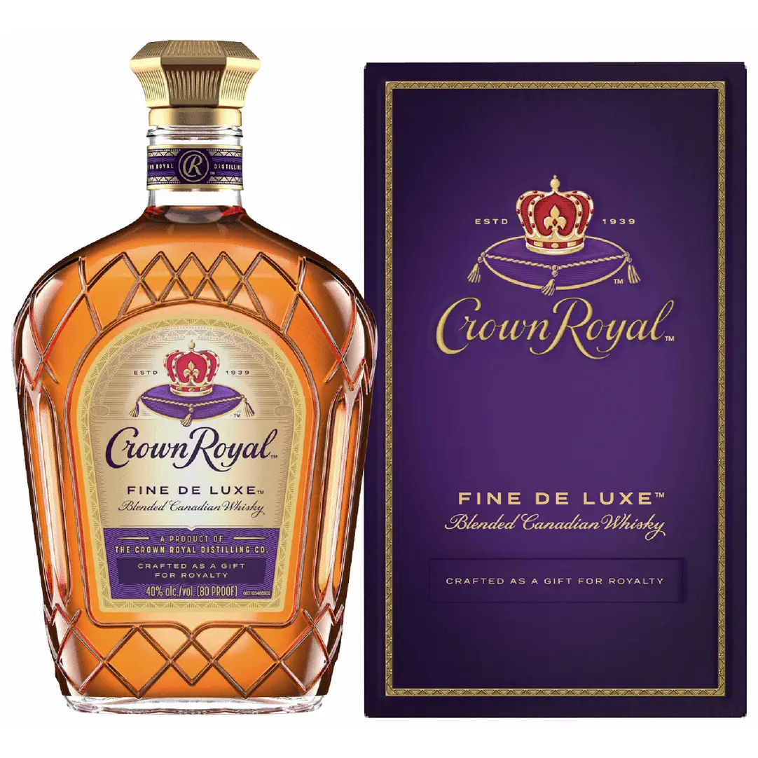 Crown Royal Fine De Luxe whiskey bottle and packaging on a white background