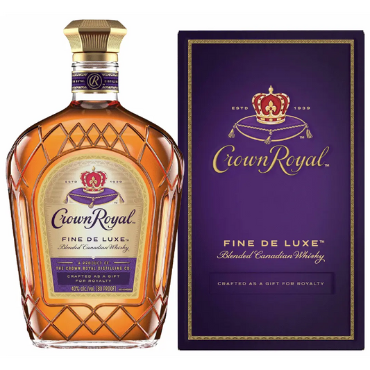 Crown Royal Fine De Luxe whiskey bottle and packaging on a white background