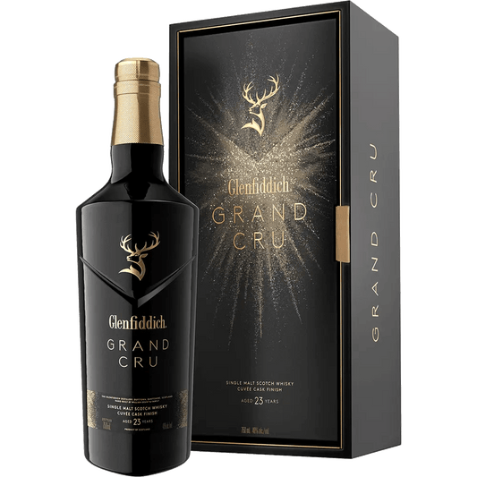 Glenfiddich Grand Cru single malt Scotch whisky, 23 years old, in a black bottle with gold and white labeling, accompanied by its black packaging box with gold accents.