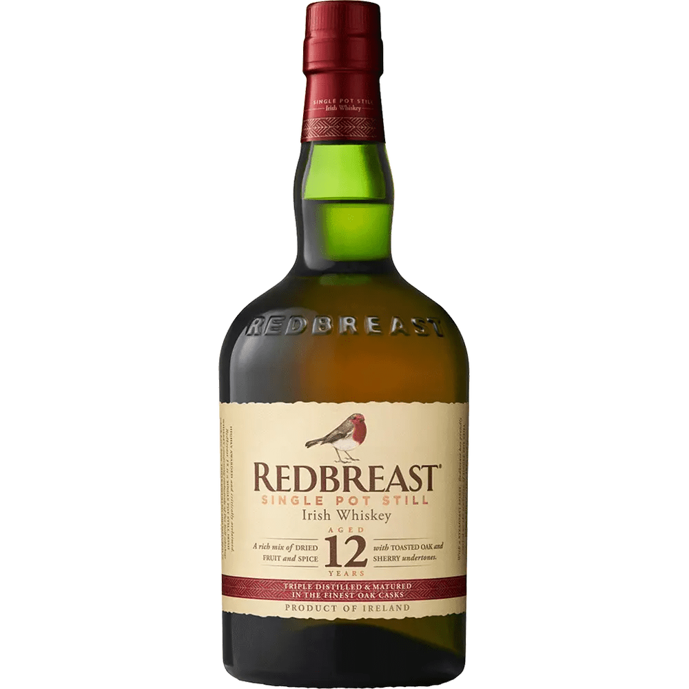 Bottle of Redbreast 12 Year Irish Whiskey with a beige label, red and green text, and a picture of a red-breasted merganser bird.