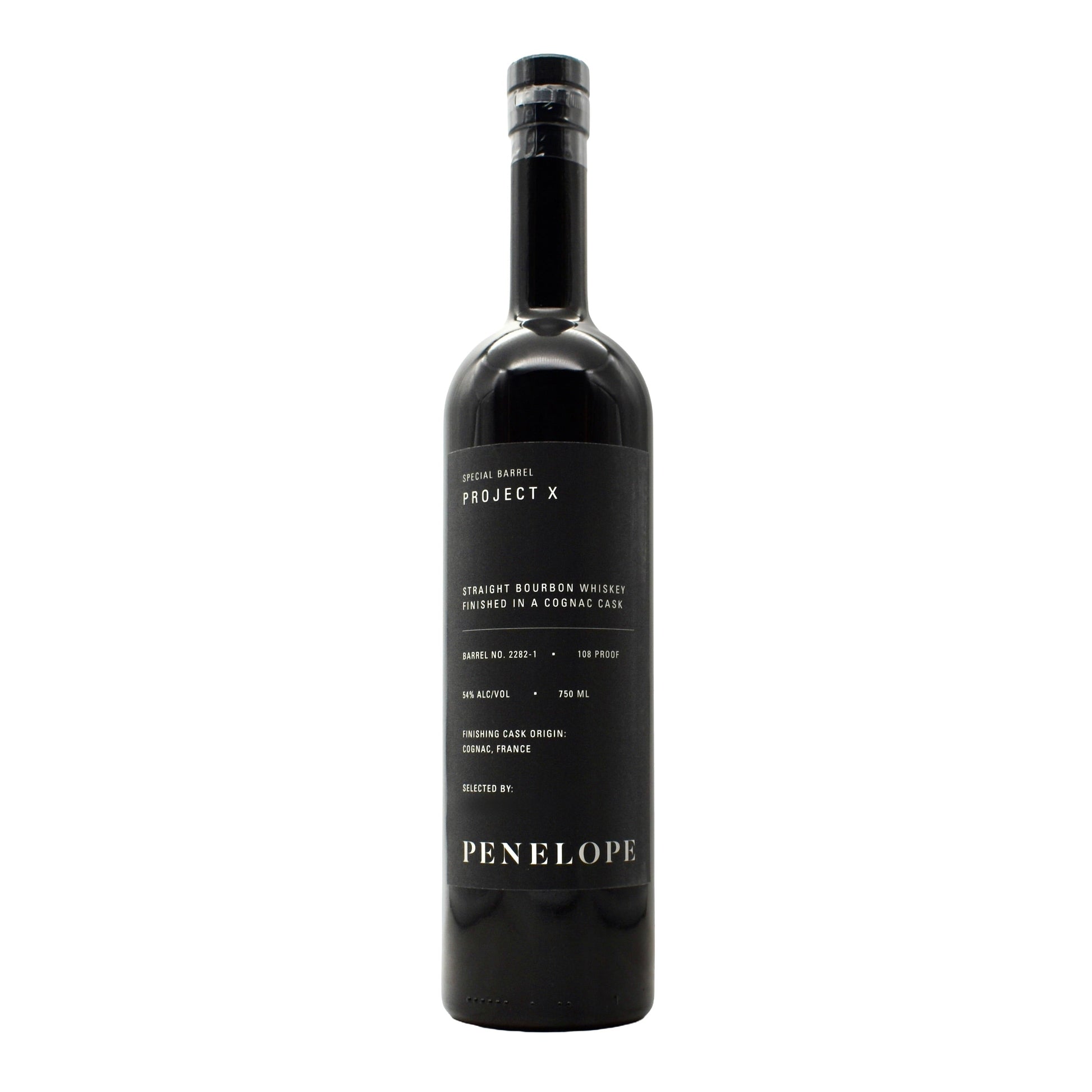 Black bottle of Penelope Project X whiskey on a white background