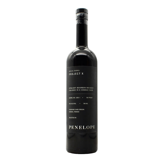 Black bottle of Penelope Project X whiskey on a white background