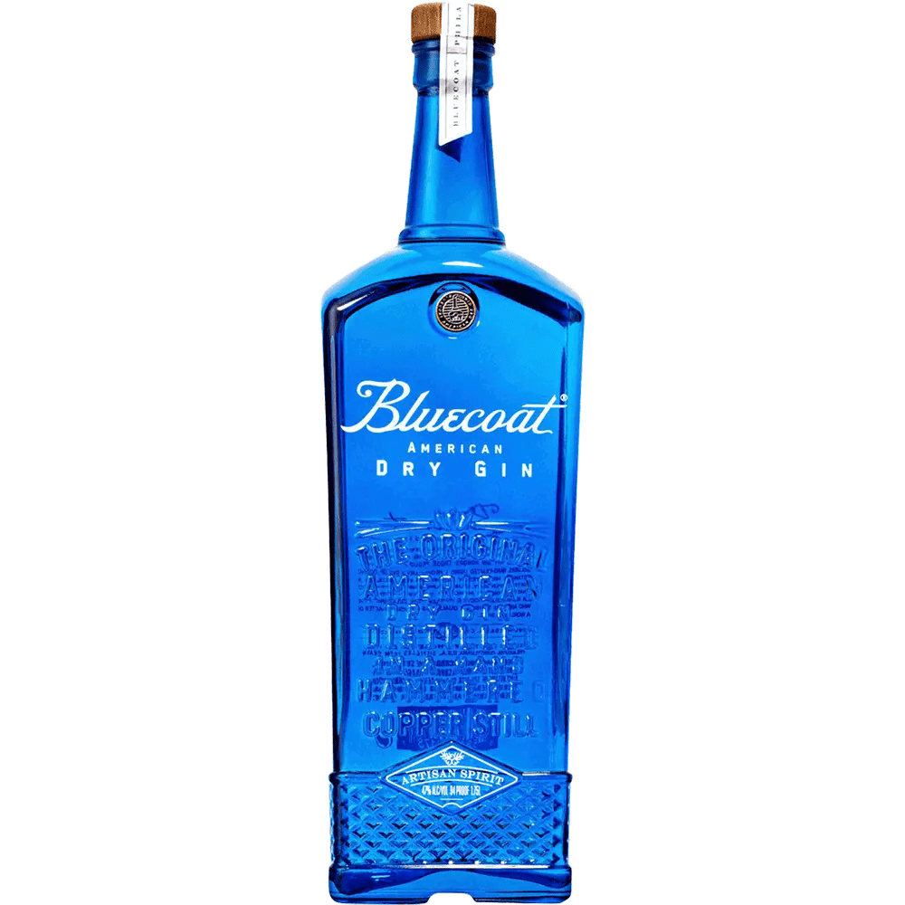 A bottle of Bluecoat American Dry Gin with a blue label and blue cap.