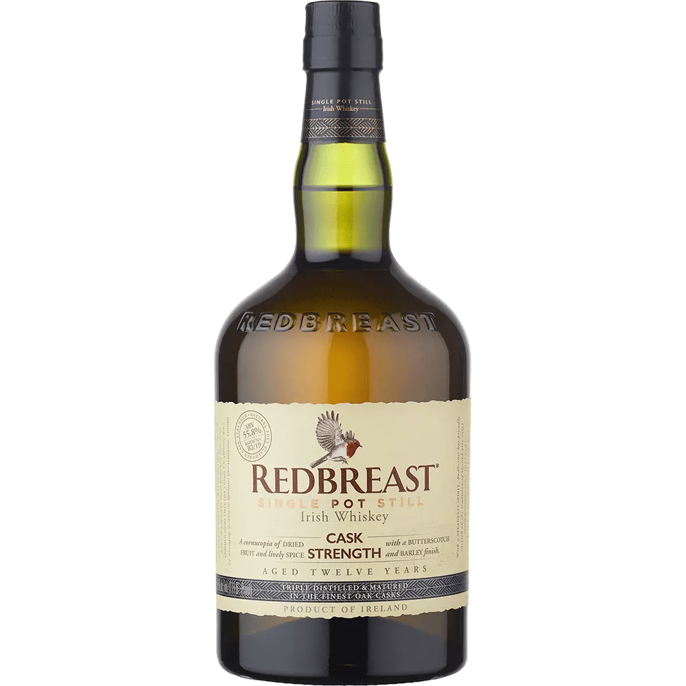 A bottle of Redbreast Cask Strength 12 Year Irish whiskey with a label showing the brand name and the maturation details.